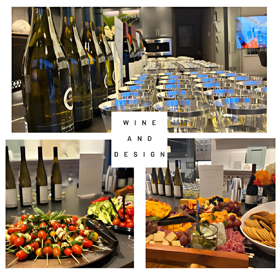 Wine bottles, glasses, and a variety of appetizers on a table for a "Wine and Design" event in a modern, stylish setting.