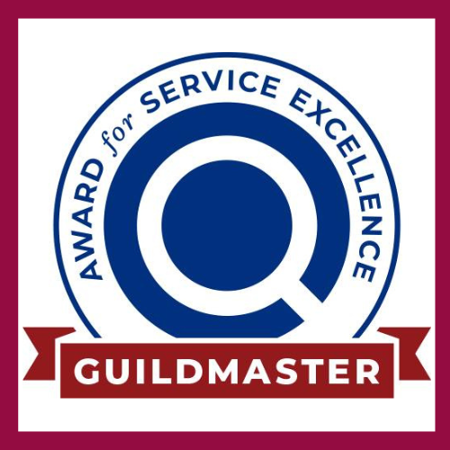 The image features a circular emblem reading "Award for Service Excellence" with "Guildmaster" in a banner below, set against a maroon border.