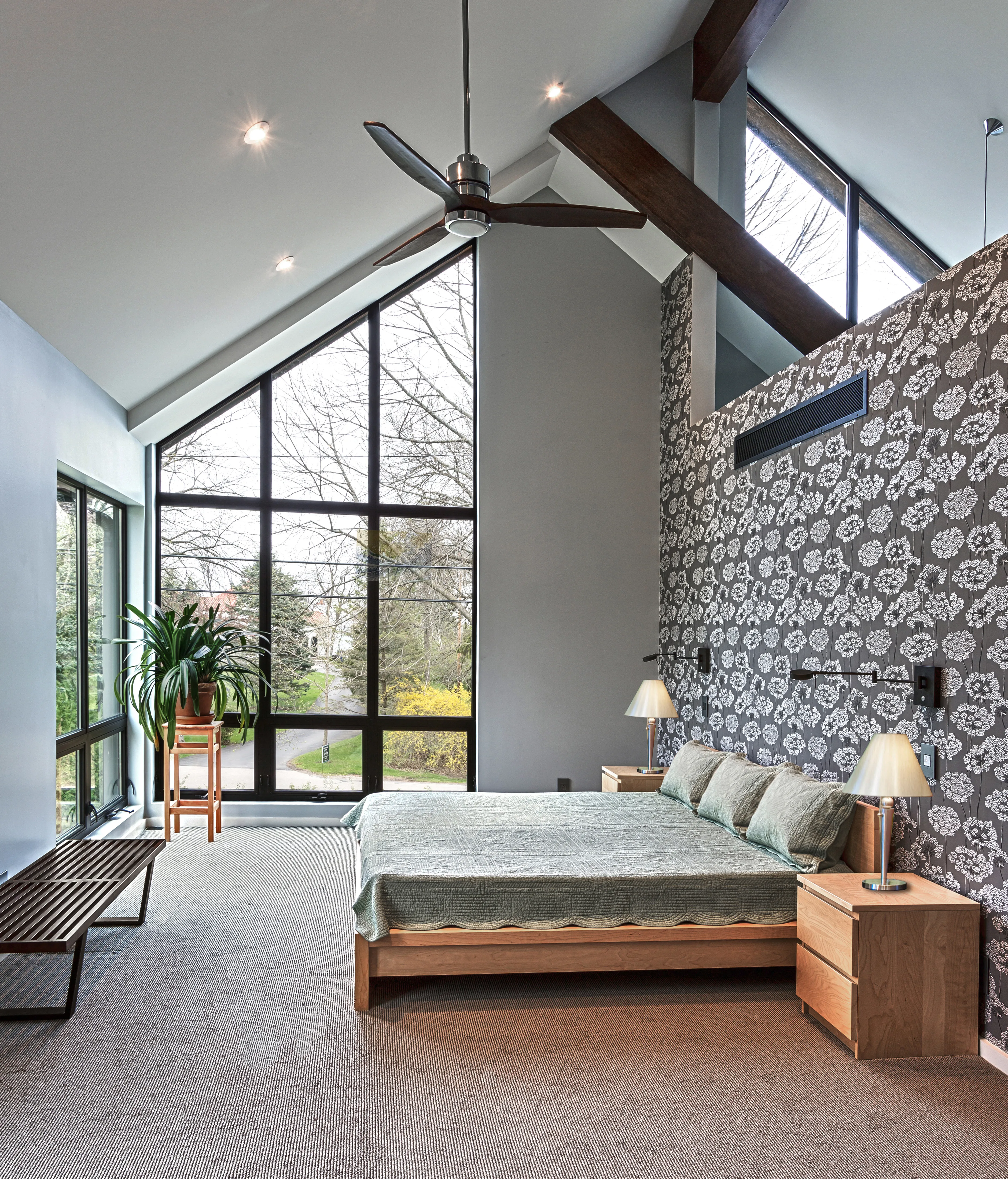 Master bedroom addition in Fox Point, WI with floor-to-ceiling windows and exposed beams